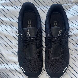 On Running woman’s shoes, worn once